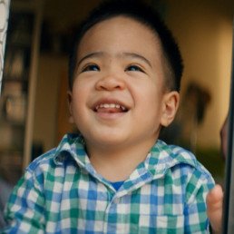 little boy smiling