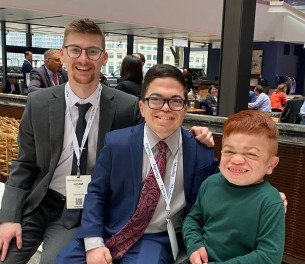 group of young men at conference