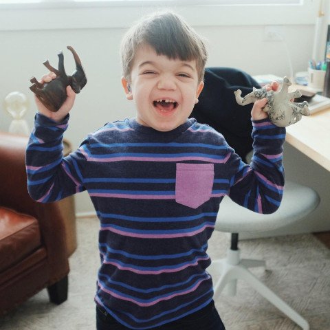 Finn playing with toys